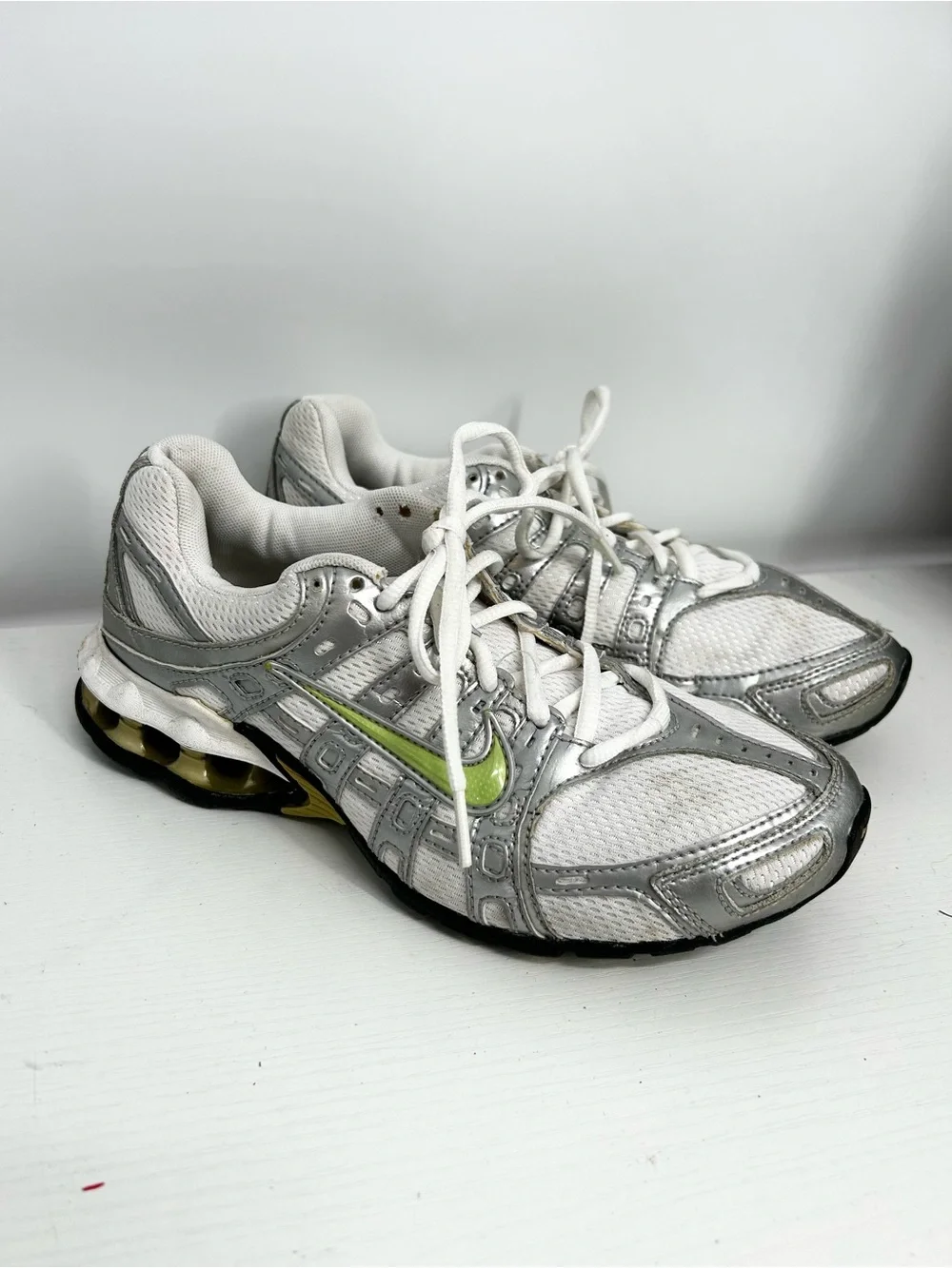 Nike size 8 Women's White & Silver Running Shoes with Lime Accent